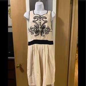 Anthropologie dress in cream. Lightweight corduroy bottom